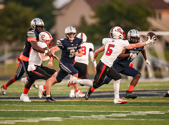 0511 Centennial vs Champlain Varsity Football-Edit