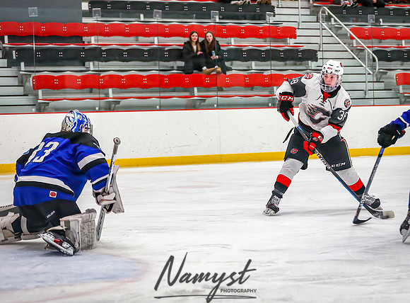 Centennial vs Rogers Varsity Hockey_289